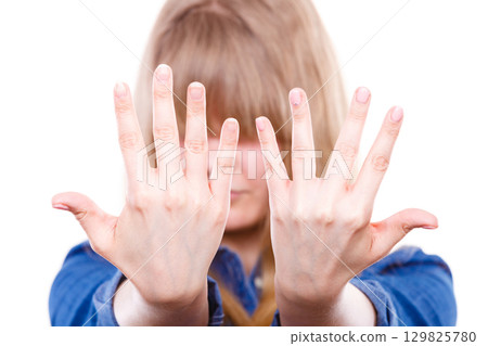 Woman presents hands nails. Woman presents hands nails. 129825780