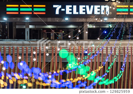 Night view of a 7-Eleven store with colorful string lights in Hangang river park in Seoul, South Korea 129825959