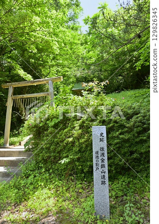 Takato Shrine torii gate and sign at the entrance to the Doyu Warito trail at Sado Gold Mine Takato Shrine torii gate and sign at the entrance to the Doyu Warito trail at Sado Gold Mine 129826345