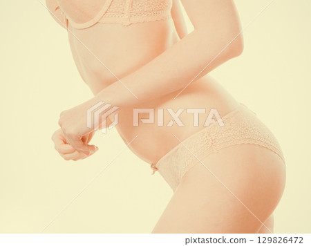 Woman body wearing lace lingerie. 129826472