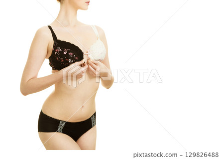 Girl of smooth body with brassiere dilemma. Girl of smooth body with brassiere dilemma. 129826488