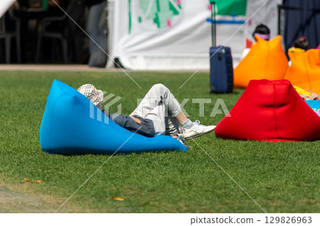 People relaxing on colorful bean bags in Seoul Plaza located in front of Seoul City Hall at Taepyeongno, Jung District, Seoul, South Korea People relaxing on colorful bean bags in Seoul Plaza located in front of Seoul City Hall at Taepyeongno, Jung District, Seoul, South Korea 129826963