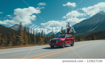 Red SUV traveling along a scenic mountain highway Red SUV traveling along a scenic mountain highway 129827280