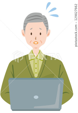 Elderly man having trouble using a computer 129827662
