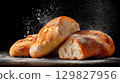 Fresh ciabatta bread on a dark background 129827956