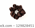 Dark brown fabric hair scrunchie isolated on white background, close-up 129828451