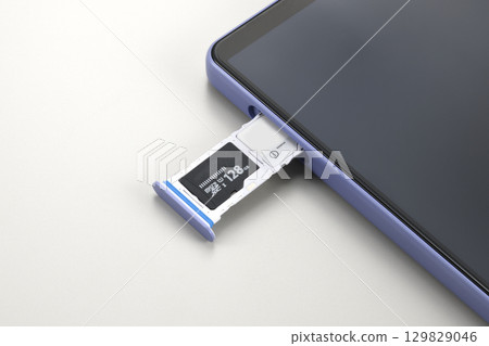 Smartphone SIM and microSD card slots Smartphone SIM and microSD card slots 129829046