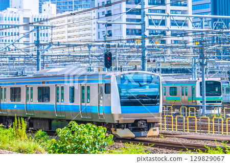 View of the Tokyo cityscape in Japan, including the Keihin-Tohoku Line (leading carriage), etc. (Between Tamachi Station and Takanawa Gateway Station) View of the Tokyo cityscape in Japan, including the Keihin-Tohoku Line (leading carriage), etc. (Between Tamachi Station and Takanawa Gateway Station) 129829067