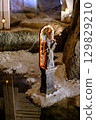 Salt statue of a saint in Wieliczka Salt statue of a saint in Wieliczka 129829210