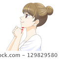 Woman doing sublingual gland massage 129829580