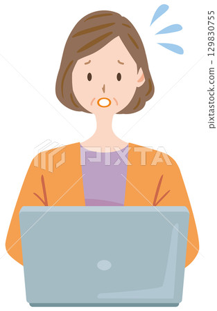 Middle-aged woman having trouble using a computer 129830755