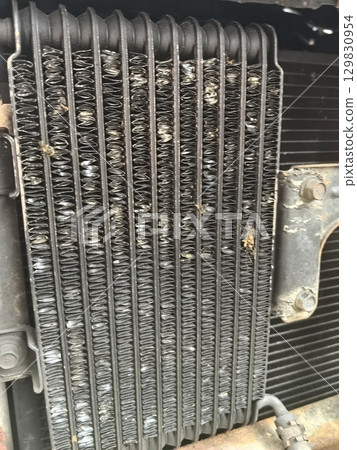 A close look shows the detailed design and state of a car radiator A close look shows the detailed design and state of a car radiator 129830954