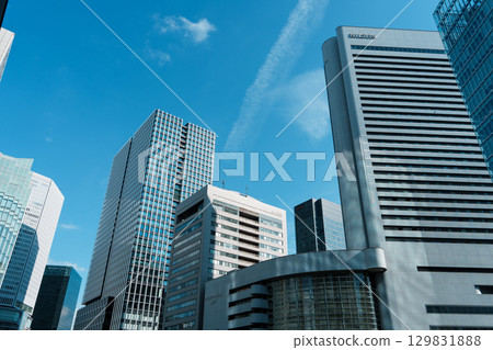 A view of the business district looking up at the skyscrapers from KITTE Osaka A view of the business district looking up at the skyscrapers from KITTE Osaka 129831888