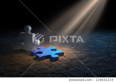 Illuminated Jigsaw Puzzle Pieces Fitting Together in Dramatic Dance of Light and Shadow 129832214
