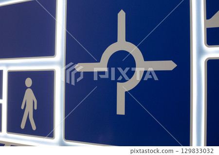 Educational panel with traffic signs, including pedestrian and directional symbols. Designed to teach road safety and traffic rules. Interactive display for learning road signs and traffic regulation Educational panel with traffic signs, including pedestrian and directional symbols. Designed to teach road safety and traffic rules. Interactive display for learning road signs and traffic regulation 129833032