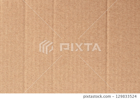Brown cardboard sheet abstract background, texture of recycle paper box in old vintage pattern for design art work. Brown cardboard sheet abstract background, texture of recycle paper box in old vintage pattern for design art work. 129833524