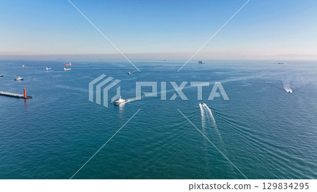 Drone aerial photography of ocean and ships 129834295