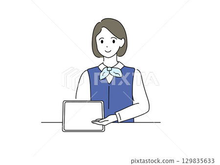 A woman in a uniform using a computer A woman in a uniform using a computer 129835633