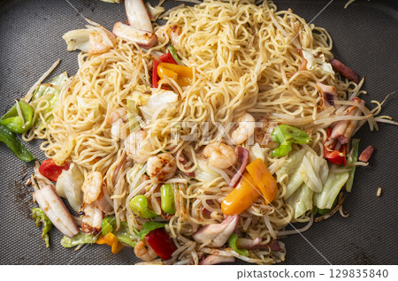 Salt-fried noodles on a hot plate Salt-fried noodles on a hot plate 129835840