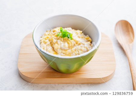 Microwave cooking: Egg porridge with oatmeal Microwave cooking: Egg porridge with oatmeal 129836759