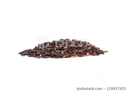 Black sticky rice pile isolated on white background 129837925