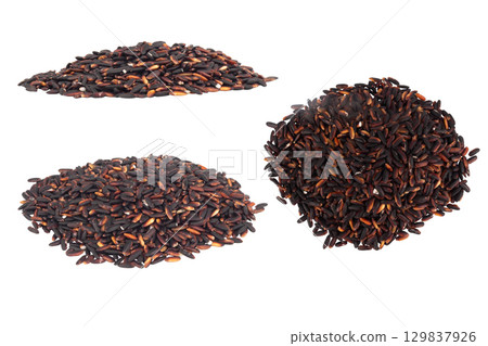 Black sticky rice pile isolated on white background 129837926