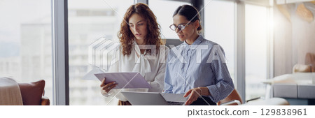 Engaging in a Collaborative Business Meeting Within a Modern Office Environment Today 129838961