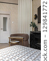 Stylish Living Room Corner with Modern Chair 129841772