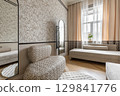 Scandinavian Interior with Patterned Chair and Window 129841776