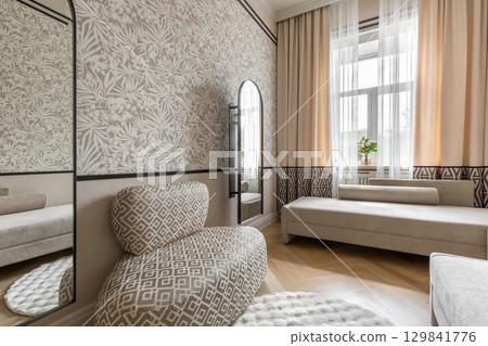 Scandinavian Interior with Patterned Chair and Window 129841776
