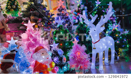 Christmas decorations glowing in the dark creating a festive atmosphere 129841972