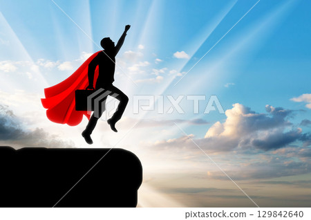 Superhero businessman flies Superhero businessman flies 129842640