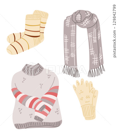 Warm winter clothing set including socks, scarf, gloves, and striped sweater in soft cozy colors 129842799
