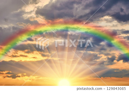 Beautiful evening sunset with rainbow 129843085