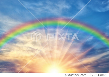 Beautiful evening sunset with rainbow 129843088