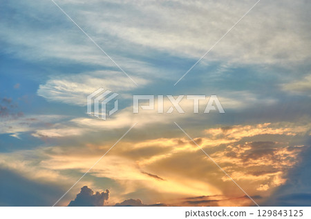 Cloud the evening sky at sunset Cloud the evening sky at sunset 129843125