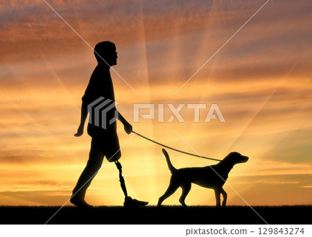 Disabled man with prosthetic leg 129843274