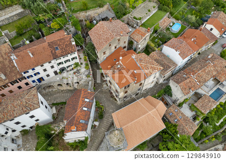 Stone houses and streets of Motovun in Istria, Croatia. 129843910