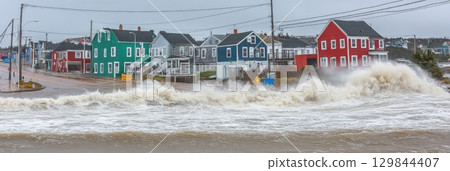 Coastal Homes Storm Surge Dramatic Ocean Waves Powerful Nature Winter Seascape Houses Flooding sky Coastal Homes Storm Surge Dramatic Ocean Waves Powerful Nature Winter Seascape Houses Flooding sky 129844407