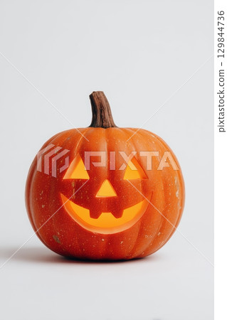 A cheerful Smiling JackOLantern Pumpkin crafted for the delightful Halloween Celebration 129844736