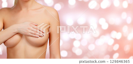 Breast cancer concept, abstract background with blurred lights Breast cancer concept, abstract background with blurred lights 129846365