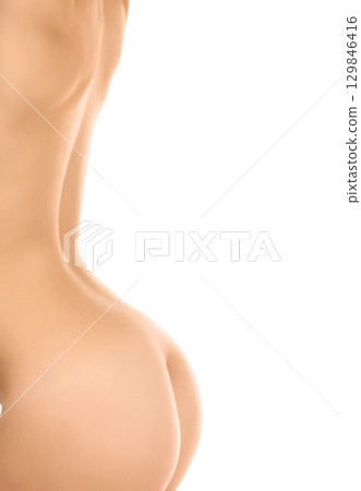 Naked female back 129846416