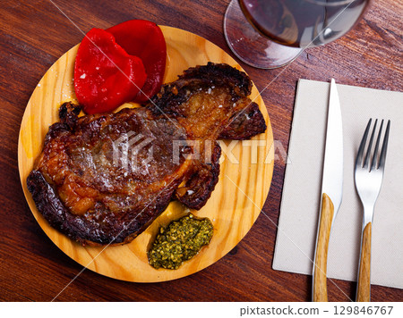 Entrecote with salsa verde sauce 129846767