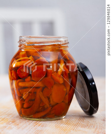 Glass jar of marinated mushrooms nameko Glass jar of marinated mushrooms nameko 129846814