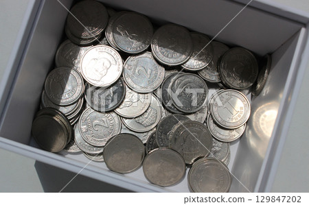 Heap Of Ukrainian Money In Coins At The Bottom Of White Box Closeup View Stock Photo 129847202
