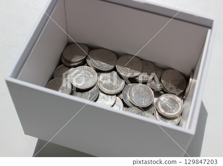 White Box With Ukrainian Silvery Coins On White Surface Stock Photo 129847203