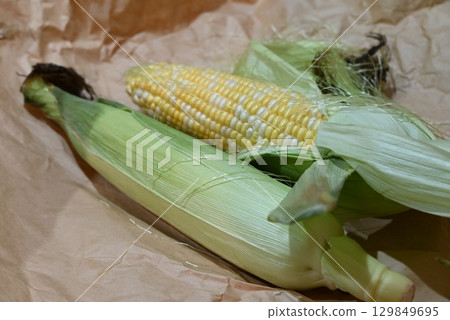 Peeled corn packed with kernels Peeled corn packed with kernels 129849695