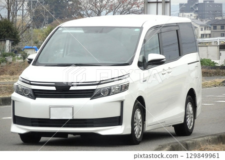 A car parked in a parking lot (Toyota Voxy, 3rd generation) 129849961