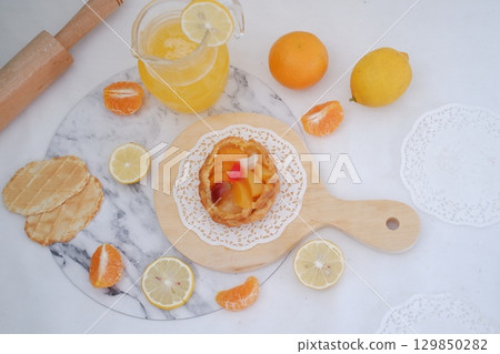 Tropical Fruit Dessert in Soft Pastel Setting Tropical Fruit Dessert in Soft Pastel Setting 129850282