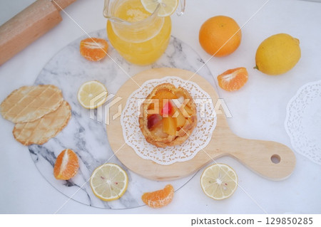 Tropical Fruit Dessert in Soft Pastel Setting 129850285